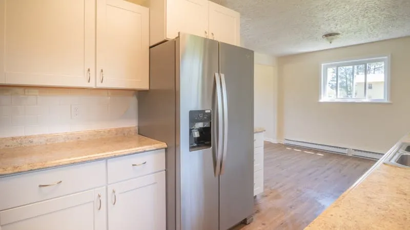 modern kitchen with appliances ready for rental apartment